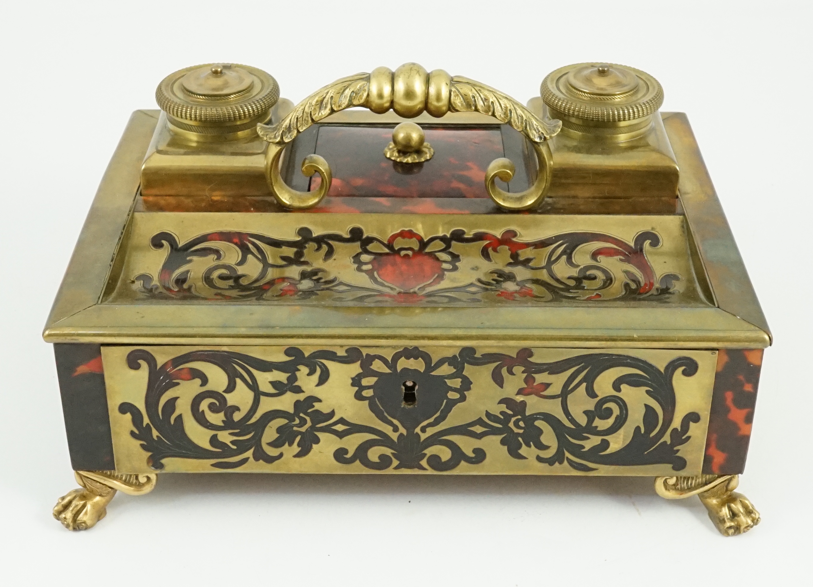 A 19th century Louis XIV style red boulle inkstand, 25cm wide, 18cm deep, 13cm high